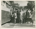 Female Students Getting on a Bus by Brooklyn College