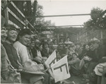 Group of Students Being Transported in a Truck by Arnold Eagle