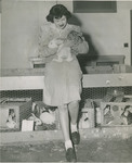 Student Holding Bunnies by Brooklyn College