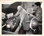 Closed-circuit Television Students Film a Voltage-regulator check by William C.H. Meyers by New York Trade School